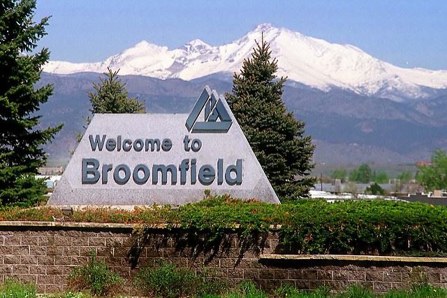 Broomfield CO mold testing with Flatirons and snow-covered peaks in the background