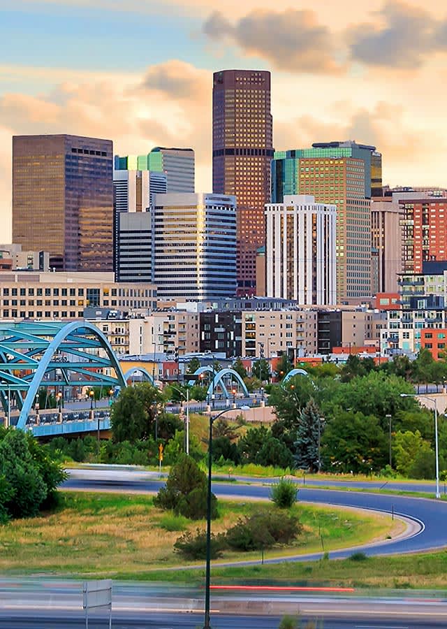 Denver skyline view with Millennium Bridge and high-rise buildings