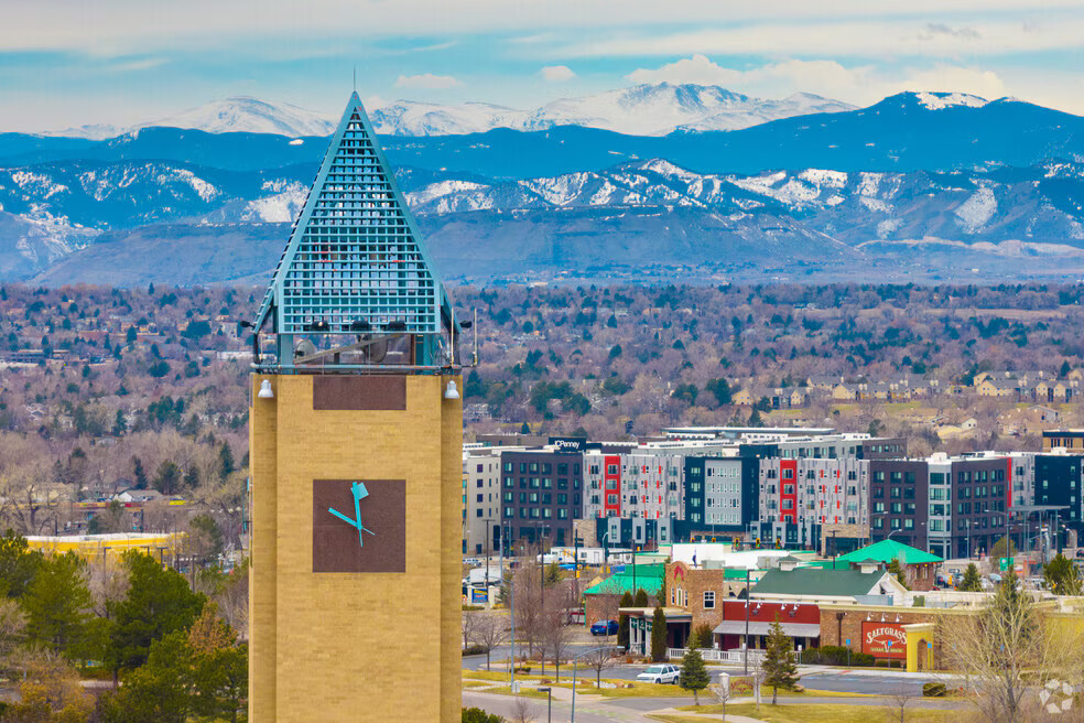 Clocktower in Westminster CO with mountain backdrop – mold inspection service area